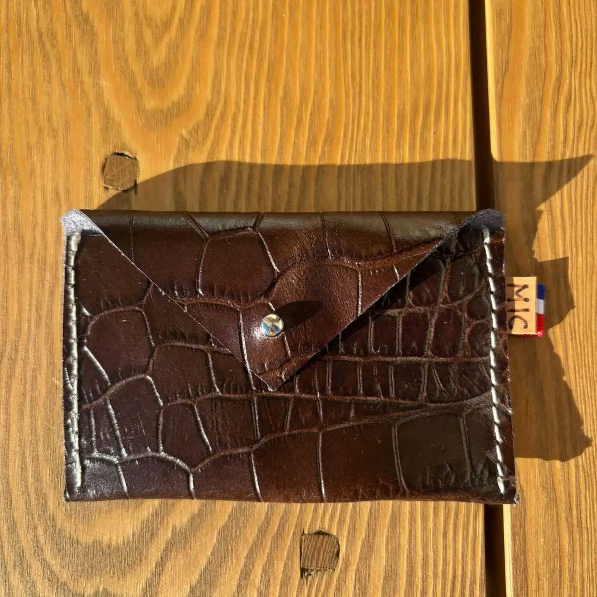Petite pochette en cuir marron effet croco