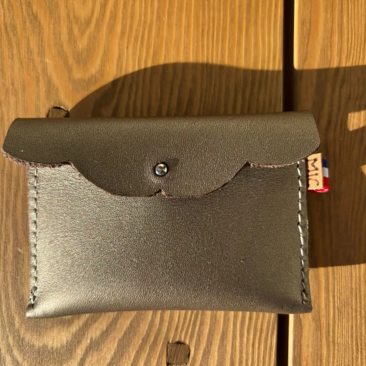 Petite pochette en cuir effet vague argent