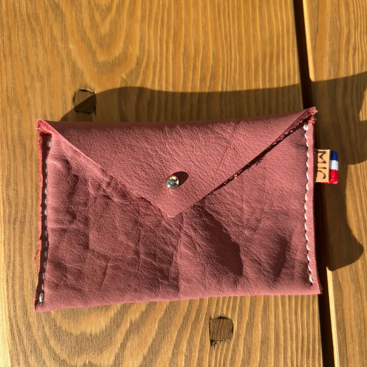 Petite pochette en cuir lisse vieux rose