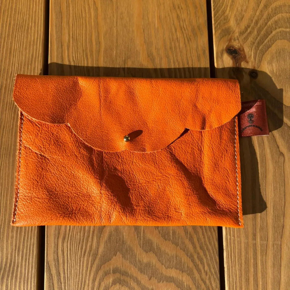 Moyenne pochette en cuir lisse orange